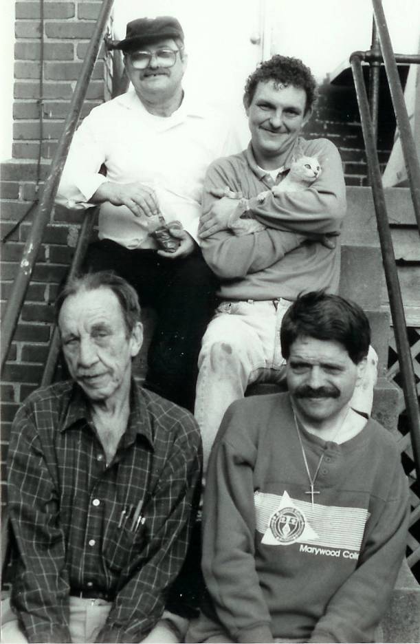 L’Arche Greater Washington, D.C., founding members (from back left) Mo Higgs, Glenn Houser, Gene Sampson, and Michael Schaff. Mo and Michael still live in L’Arche. Glenn lives in his own apartment in D.C.; Gene passed away in 2011. Photo by Anne Holzman