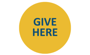Yellow circle with blue text that reads "Give Here"
